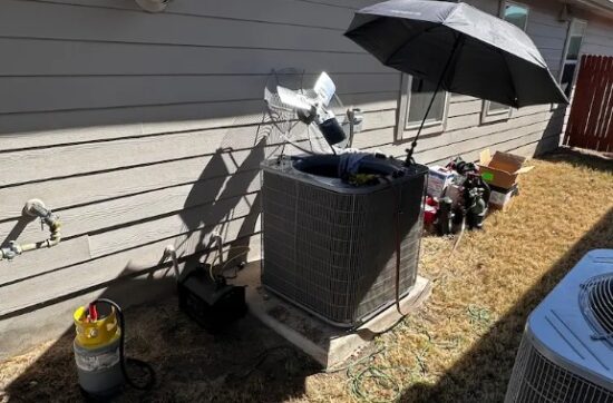 HVAC technician diagnosing AC compressor in Cedar Park TX